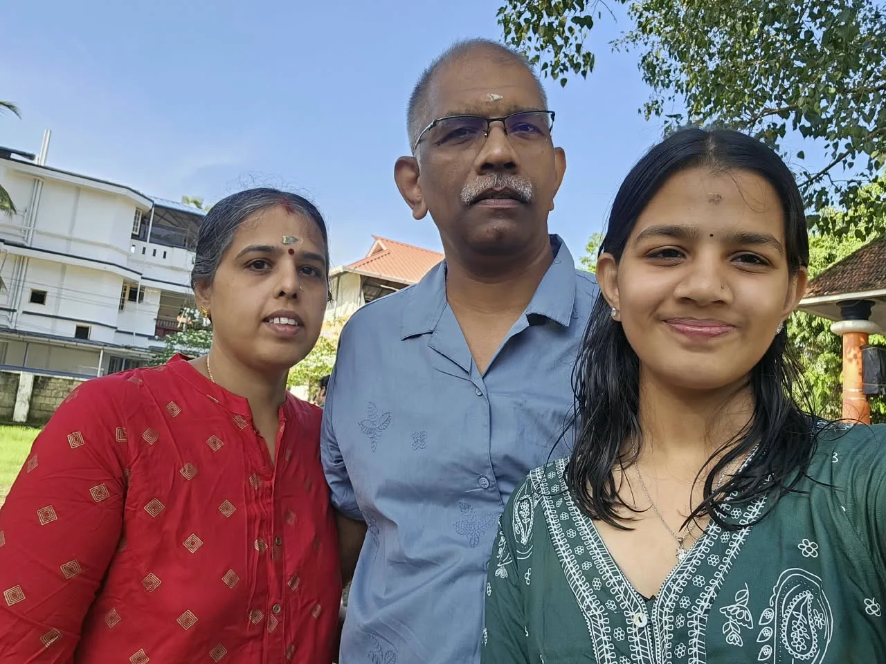 Anand T S Ramakrishnan, a FinEdge client from Cochin, with his family outdoors