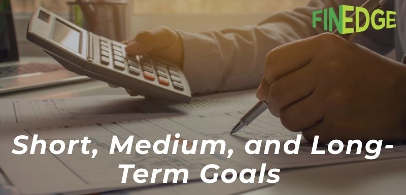 Person using calculator and pen to plan finances on paper with text overlay 'Short, Medium, and Long-Term Goals' and FinEdge logo in top-right corner – representing financial goal categorization and planning.