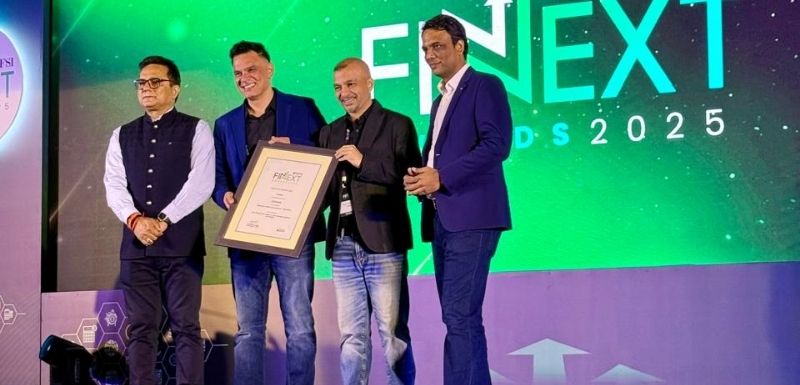 FinEdge team receives the ET BFSI FinNext 2025 award on stage for their innovative wealth planning platform DiA, celebrating impact and investor-centric innovation.